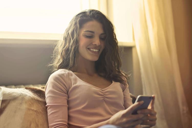 Girl on couch with phone